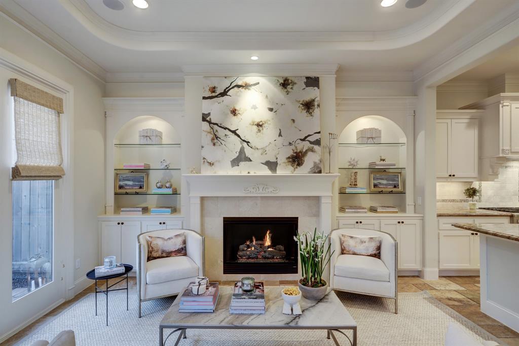 Another view of the Formal Living Room with also features a Coffered ceiling and Built-in Speakers.