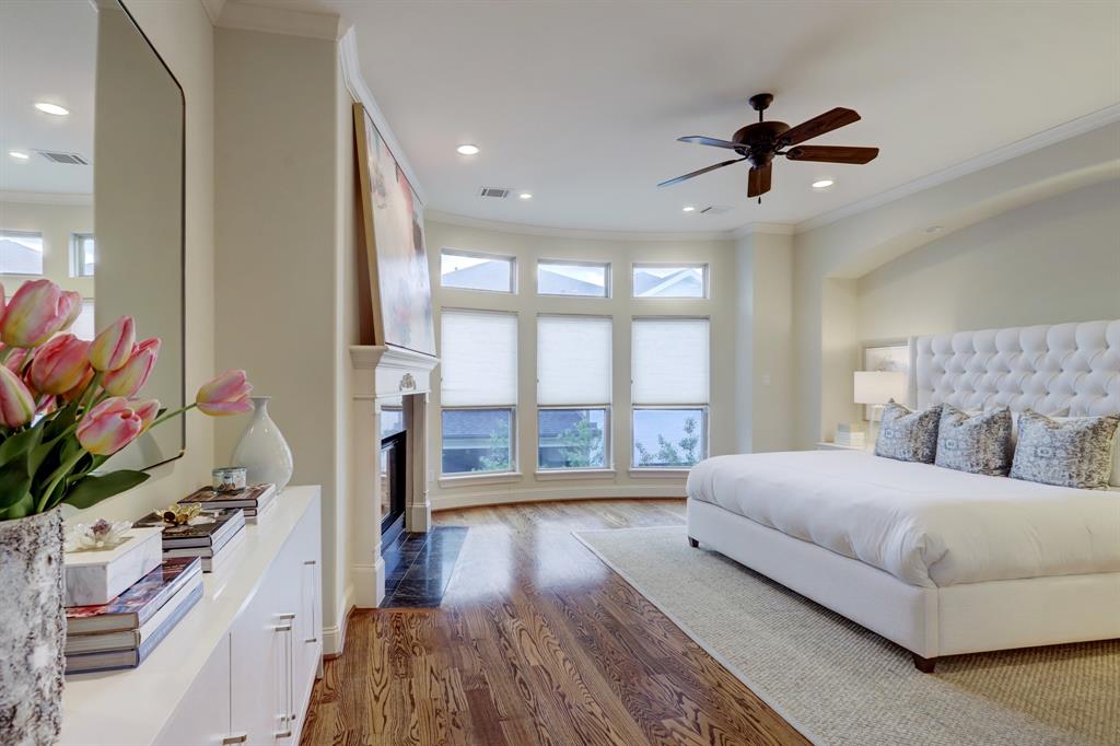 A luxurious Primary Suite is an understatement! Gleaming hardwood floors, gas fireplace, windows treatments and more......