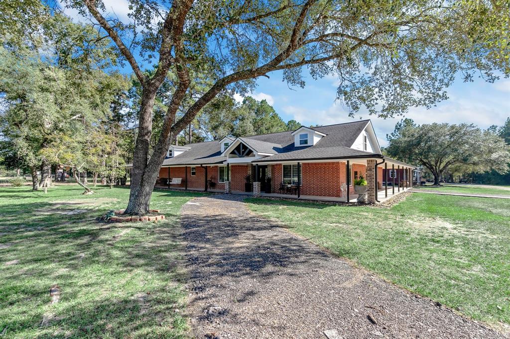 This Home Was Restored Beautifully and Correctly! Rehabbed By The Contractor Who Lives In It!! Photos and Video Speak For Themselves! Built in 1983 & updated in the last 2 yrs.This Beauty is 4745 s.f. on 2.853 unrestricted, cleared acres. Veranda all the way around. Downstairs/3 oversized Bdrms, HUGE Walk-in Closets. 3 Perfectly Remodeled Bathrms, One Great Room. Kitchen w/elegant Quartzite counter tops, Extra Large island, flows to the dinning area and then living area! Flex Rm can be anything! Office off of the hallway w/beautiful sliding barn door.Utility/Mud Room room can fit W/D,freezers,shelves for food and more! UPSTAIRS has tons of room too. Living area, Bedroom and xtra  Flex Rm. New A/Cs, Roof 5yrs, conventional septic. Older build. on property can stay or will be removed.Residential/Poss. Commercial. Bring your own business here. Plenty of room and this is a growing area!! No Flooding! 2 tax I.D.s for 2.5 acres +.3829 acres. Horse head statues do not convey w/sale.