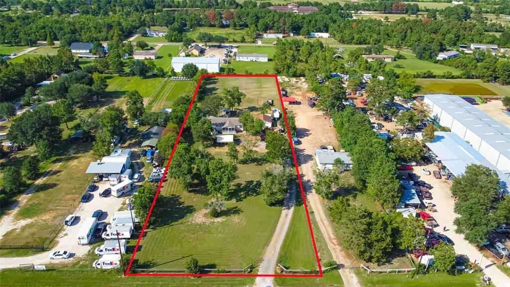 Don't miss this opportunity to own a 2-acre unrestricted land with a quaint home on it. Priced at lot value, no value has been established on a manufactured home as it needs rehab and perhaps mold remediation. The land would be suitable for commercial or residential, frontage with high traffic count and visibility. The manufactured home will be left on the property, selling "AS IS"  where is, with no guarantees or warranties.