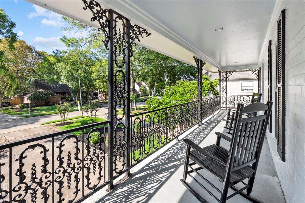 Take in the fresh air and neighborhood views from the second floors covered balcony. This is just one of several ways offered to enjoy the outdoors.