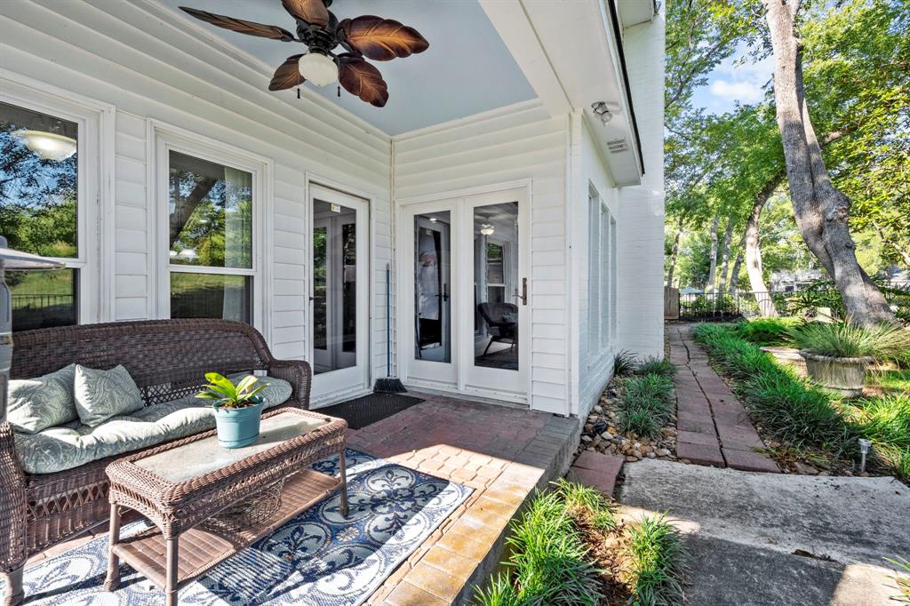 Step out back to a covered patio with a lit ceiling fan, to enjoy the space any time of day or year. Add your patio furniture to create a lovely outdoor seating or alfresco dining space.