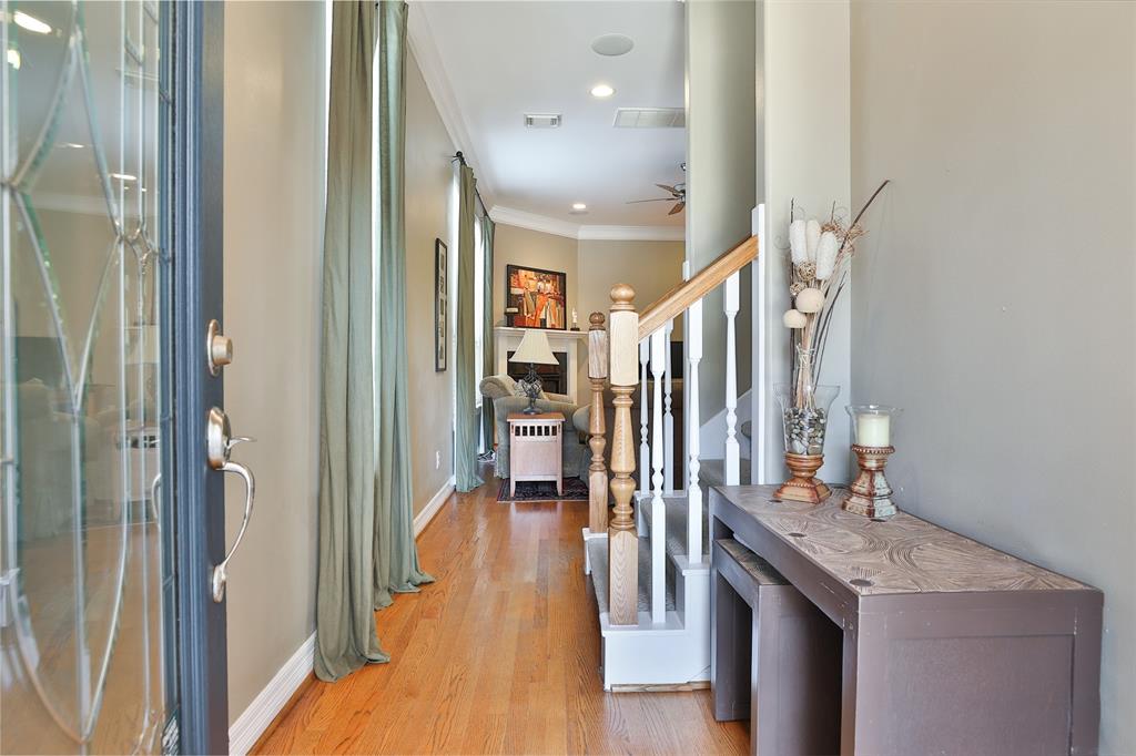 The entry way from the front door to the living room area is light and bright.