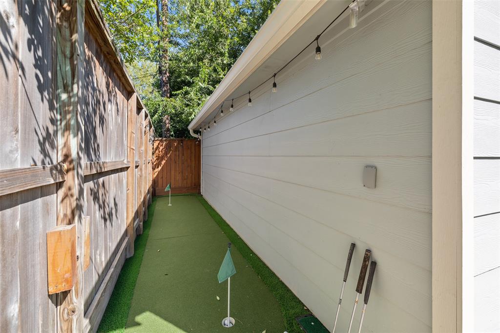 This home also features a bonus putting green behind the garage.