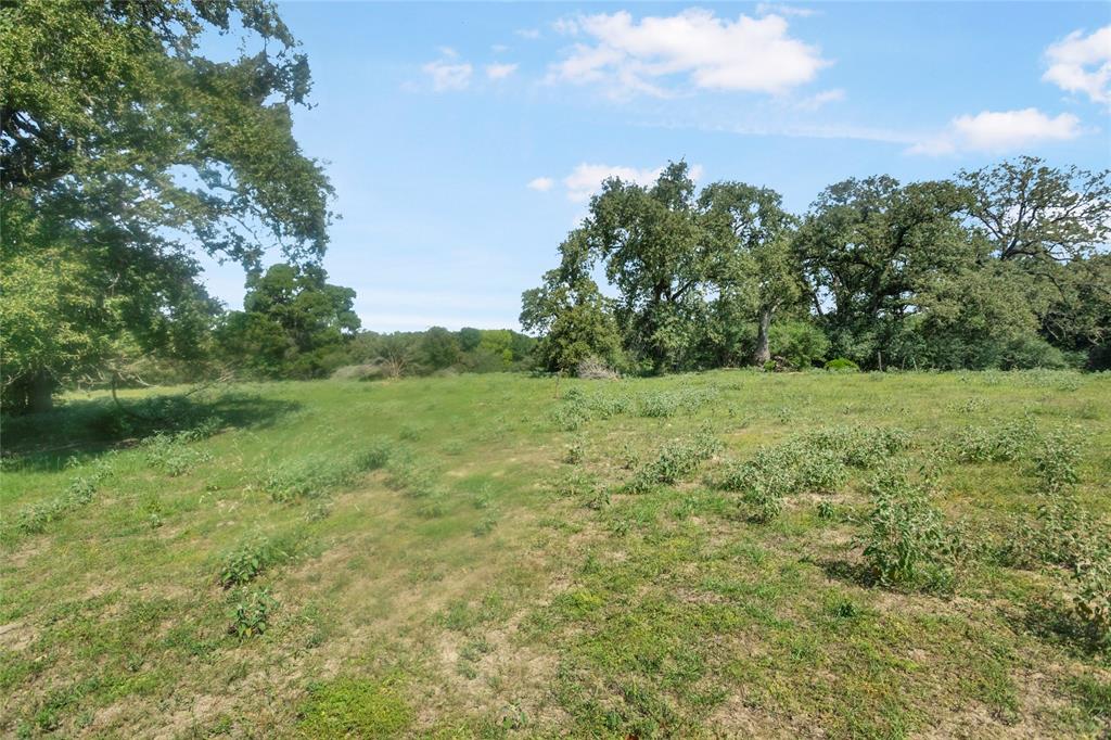15 Acres located on the scenic country road FM 908.  The property is Ag Exempt and has a mixture of open pasture and scattered trees with 3 ponds.  Water is provided by Southwest Milam Water and has a meter on the property. Electricity is already on the property.  Located in the Caldwell School District and is an easy commute to Caldwell or Rockdale.  This property is located just over 40 miles from the Samsung 
new location in Roundrock.  This location would be prefect for a new home with just the right amount of land for your leisure and enjoyment.

The Mobile home on the property adds no value.