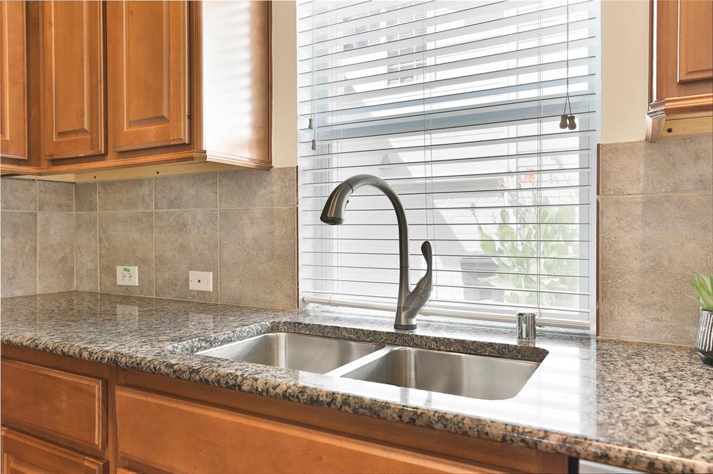 The window over the sink provides ample natural light.
