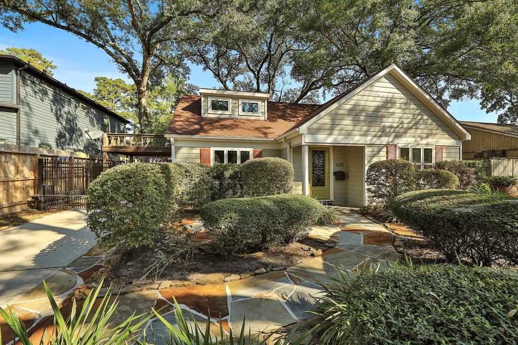 The curb appeal welcomes you into this updated traditional Garden Oaks home on a desirable block within walking distance to popular neighborhood restaurants and retail. As you enter the home you are greeted by fabulous wood ship-stairs in the entryway. The living room is filled with natural light and is open to the kitchen through the breakfast bar next to the shiplap accent wall. Spacious kitchen features cabinets with Texas hardware and glass fronts, granite counters, under-counter lighting, and a beautiful wood slat ceiling. The cozy dining is accessible through the kitchen and entry and is perfect for entertaining. Barn doors open to the primary suite with a large walk-in closet, corner soaking tub, and separate shower with stone floor. Secondary bedrooms are downstairs and the possible 4th bedroom upstairs can also be a home office or playroom. The backyard oasis is shaded by an amazing Oak surrounded by a huge deck. Imagine you are on vacation with the beach mural and cabana bar.