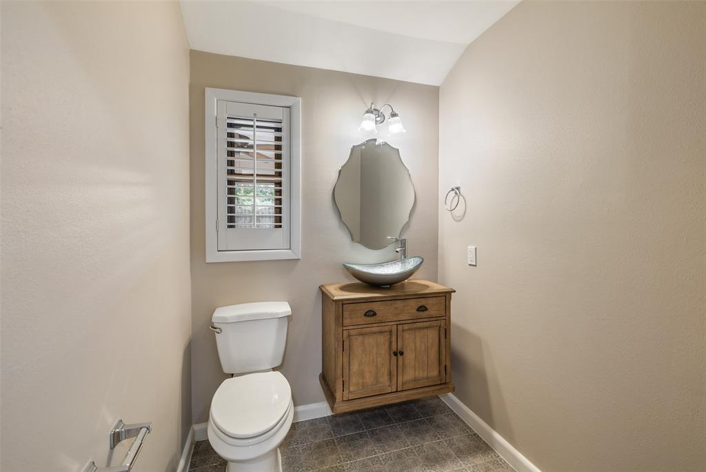 Updated half bath is perfect for guests and entertaining.