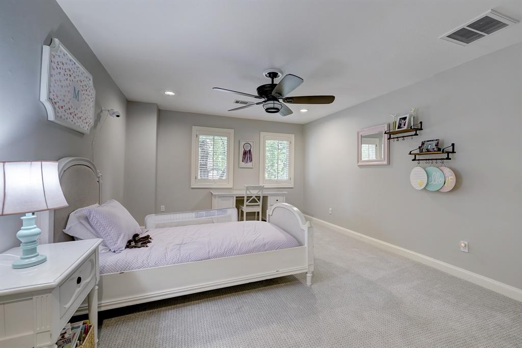 Also located near the top of the staircase is another large bedroom, this one overlooking the front yard. The carpet throughout the second floor is new since July 2019.