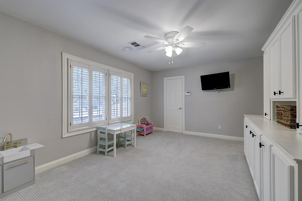 This play/media/exercise room overlooks the back yard and includes yet another closet.  Storage/closet space in this home is exceptional and above average.