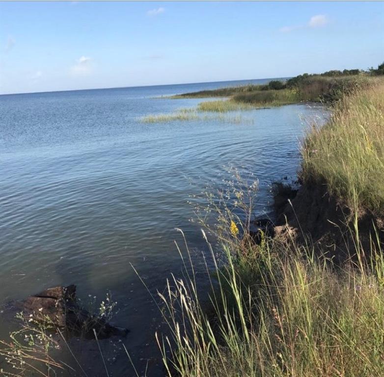 WATER FRONTAGE WITH GREAT OPPORTUNITIES. FISHING, BOATING, LAND VALUE ONLY. AND MUCH MORE. OVER 16 ACRES. TRINITY /GALVESTON BAY.