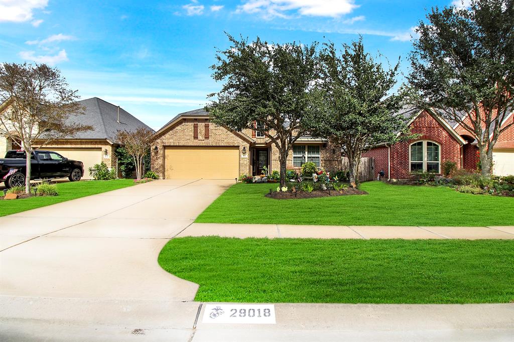 Welcome home to 29018 Oilfield Ct. This beautiful 1.5 story, 4 bedroom home is located on a Cul-de-Sac Street in the highly desired community of Firethorne! This is a sidewalk neighborhood with packet parks throughout! Low Tax rate and HOA!