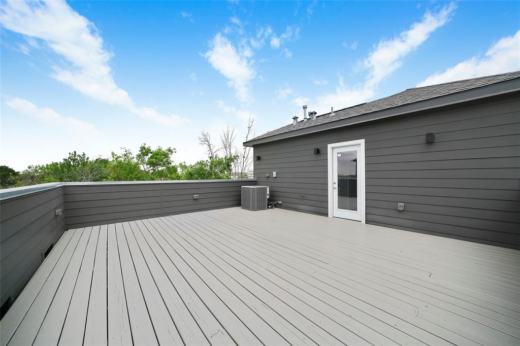 This large rooftop deck provides a great space to grill or relax in the evenings.