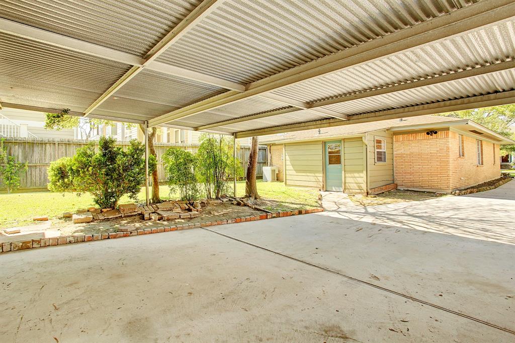 Parking in the back of this property includes a wide carport.