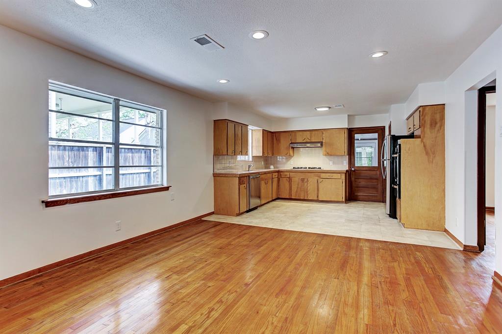 The kitchen here is larger than average and includes room for dining furniture and/or additional seating.