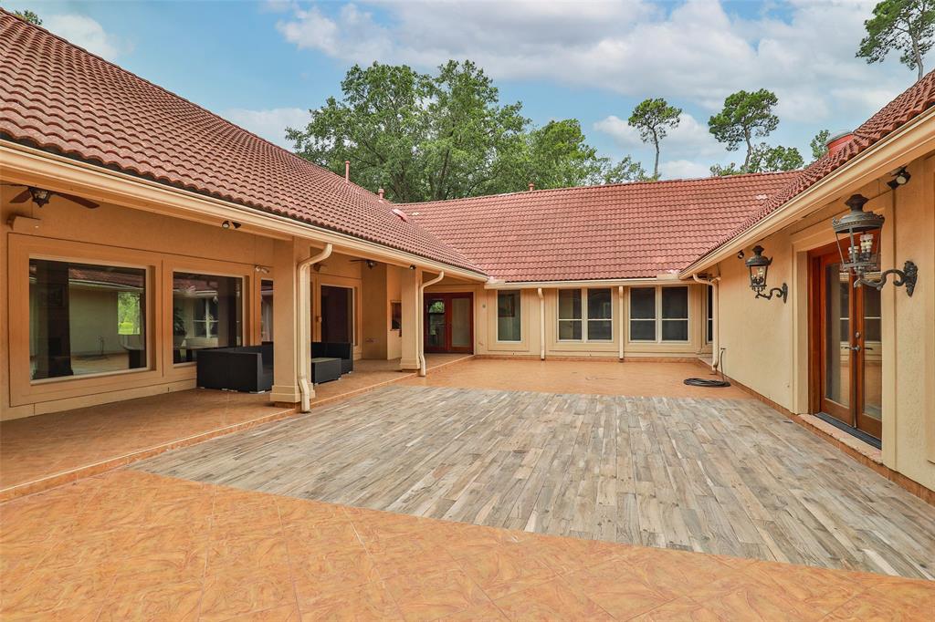 8902 Cypresswood Drive, Spring, TX 77379