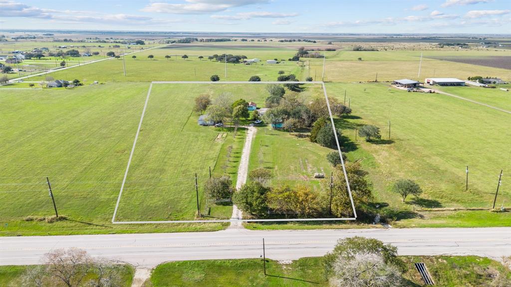Looking for your own piece of acreage in East Bernard with mature trees and serene slough running through? This  property has that and so much potential! This 10 acre tract has, Hwy 60 frontage and a full tree line located just minutes from town. No restrictions on raising livestock, poultry or fair animals! Zoned to EBISD, this could be the perfect place for you! Call today for more information and your private tour!
