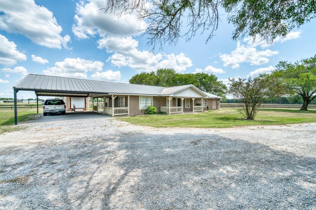 Wonderful opportunity to own 4.4 acres on Derby Lane with over 2300 sf of beautiful living space. 2 beds 1 bath. Gorgeous setting. Pond. Close to Champion Fit Equine! Easy commute. from Houston or Dallas off I-45, or 40 miles to Bryan/ College Station Texas A & M.