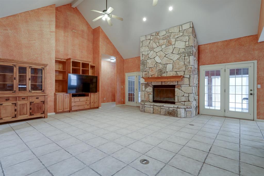 The high-ceilings and stone double-sided fireplace are breathtaking.