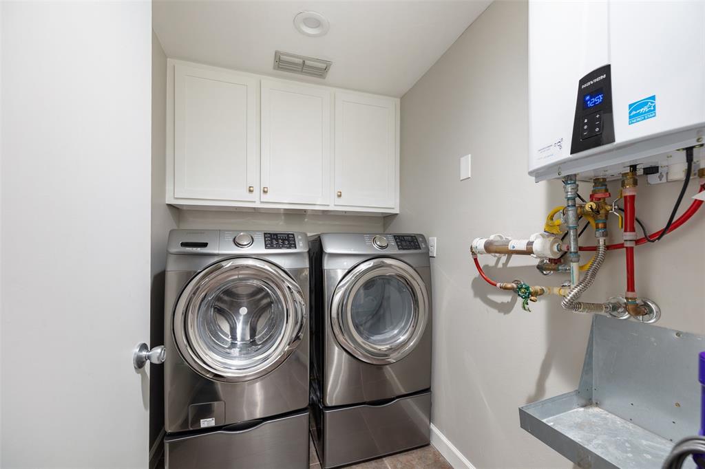 Laundry room with more storage space.