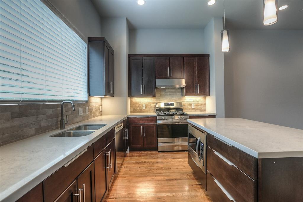 The family chef will love the center island kitchen with gas range.