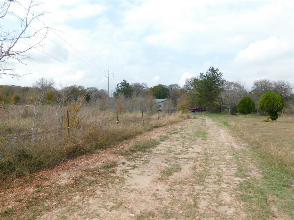 Private 4.55 Acres with 4 bedrooms 2 & a half bath retreat in Brenham, TX. Beautiful mature trees surround acreage, with scenic views of cascading neighboring land. Property is minutes from the downtown Brenham, shopping, restaurants, and central to Austin or Houston, TX. Schedule a showing today!