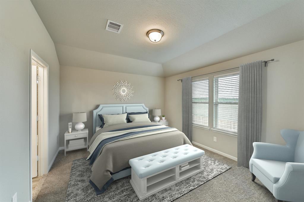 **Home is Under Construction. The photo shown here is of a completed home that has the same floor plan and similar elevation. Options and color selections may vary.**