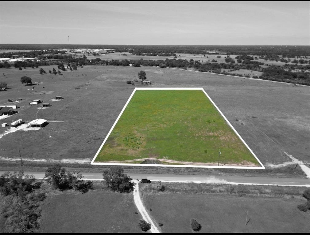 Slightly rolling, wide open pasture, 5.375 acres. Conveniently located between Hempstead and Bellville, just Northwest of Houston, with easy access to 290 or I-10. Fenced, cleared, ready to build your dream out in the country, but still close to the big city. No flood plain. New entrance. New culvert and driveway, to be put in by seller. Utilities easily obtained with two power poles at either side border of property and Austin county City water plans in place or drill your own water well. Lovely new homes are being constructed next door. Lightly restricted to protect land values. Horses, livestock welcome. Currently in Ag. Owner is Real Estate Agent.