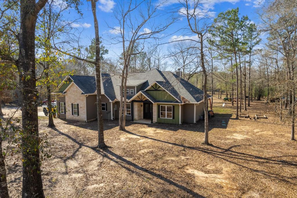Gorgeous custom home tucked away on 10 acres in the tranquil community of Peach Creek Plantation! This home truly has it all with a floor plan designed to meet your every need. Exquisite touches throughout including built on site custom door, crown molding, rustic walnut flooring, Florida storm windows, shatterproof back glass, engineered slab, tankless water heater and smart home wiring w/ audio speakers throughout. Stunning gourmet kitchen offers double ovens, farm sink, large island with a prep sink, lots of cabinets, huge walk in pantry with a hidden bonus room.  Master suite complete with tray ceilings, dual closets, and a fantastic walk in shower in master bath. Spacious secondary bedrooms with a jack and jill bath. Tons of space upstairs including a game room, media room, flex space and additional room complete with a full bath. You truly have to see this home to appreciate all it has to offer! Neighborhood includes several parks with fishing and covered areas for picnics!