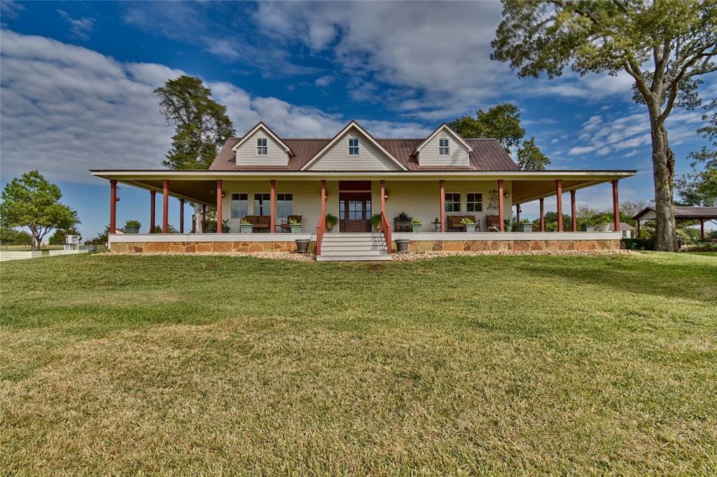 This is a must see property in the rolling hills of Austin County's West End.  It features a completely renovated and modernized (2012) 2960 Sq Ft Farmhouse with Four Bedrooms and 3.5 Baths and an 1100 Sq Ft wrap around porch.  The 1600 Sq Ft patio with fire pit is an ideal space for family gatherings or quiet evenings  The 2400 Sq Ft shop with full bath and cement floors was built in 2009 and a 1500 Sq Ft old barn built in 1936 was renovated in 2017 to include new flooring, hardie board siding, a metal roof and other unique features.  The property includes tremendous views to the west from the front porch or the patio, a 1/2 acre pond, two water wells, and irrigation thorough the 46 acres.  The current owners have an agricultural exemption for cattle covering the lightly restricted property and they believe to have 25% of the mineral interest and 100% surface control which will be conveyed.