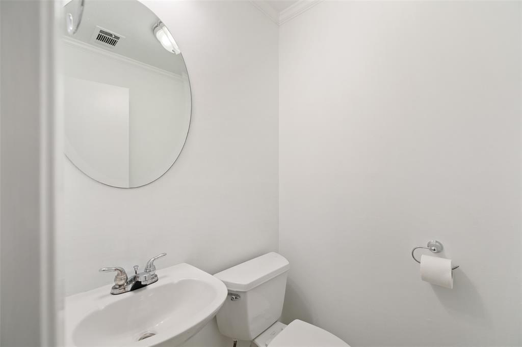 This half bathroom is conveniently located on the 1st floor.
