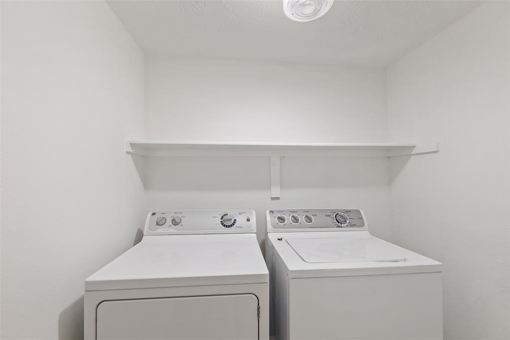 The utility room is located insight the home.