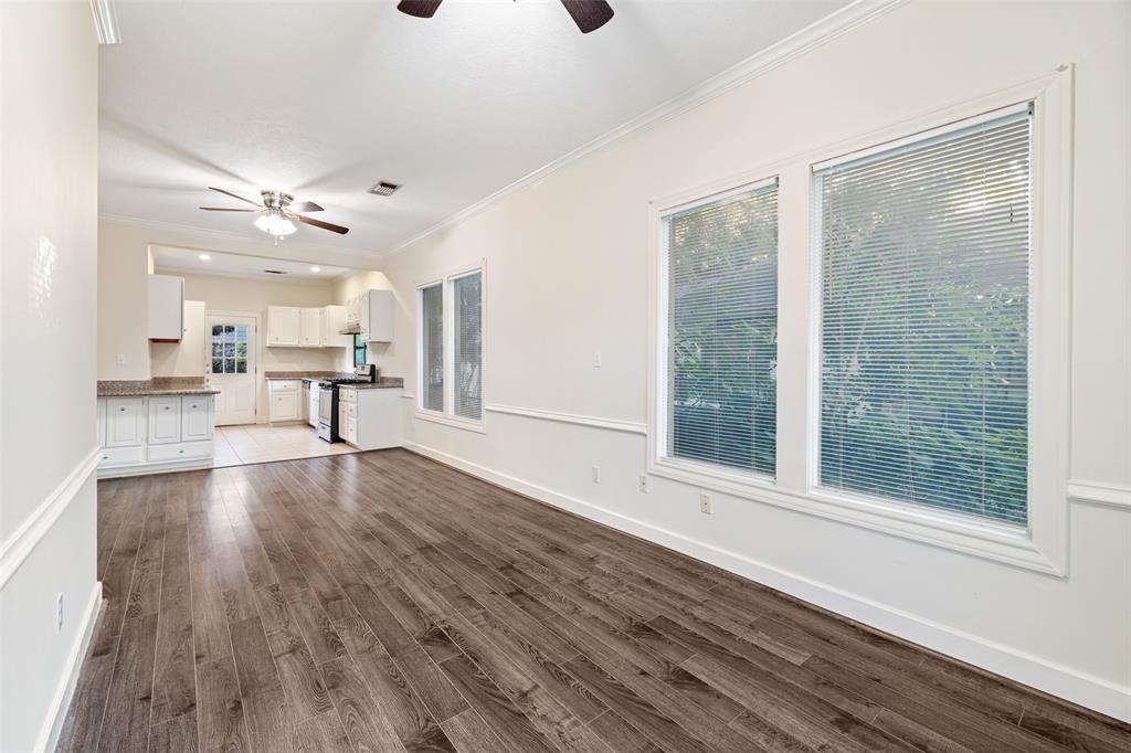 You're going to love the open floor plan, updated floors, and light and bright, freshly painted living space.