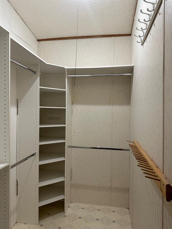 extra storage in custom mud room ajoing the master bath.