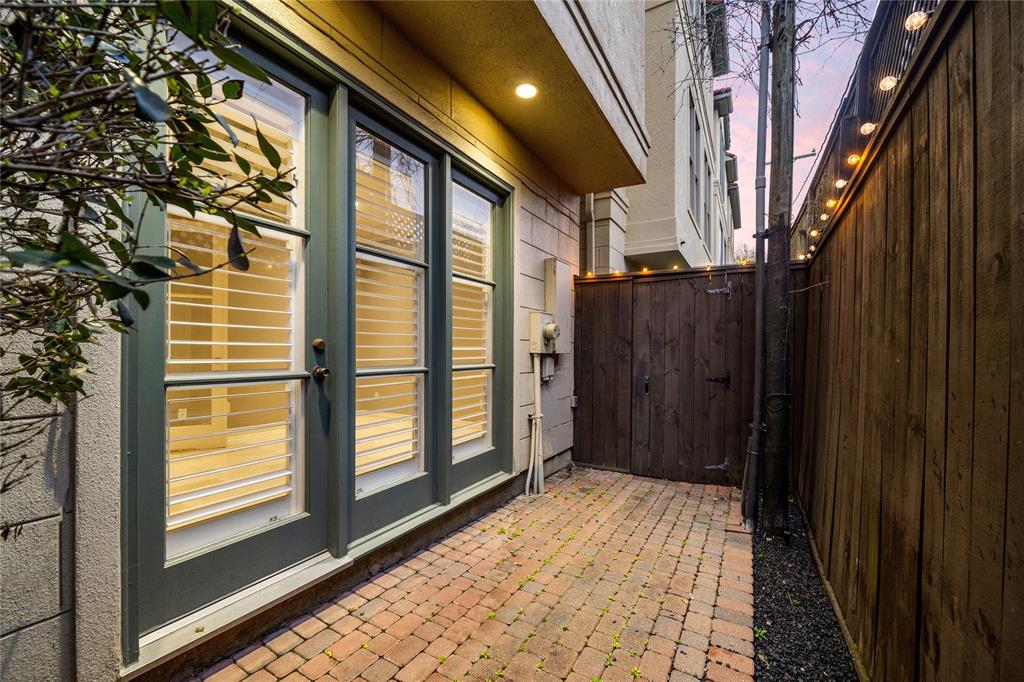 The fully fenced patio/deck provides a lovely outdoor space that can be personalized to your liking—transform it into a lush garden or furnish it with seating and outdoor decor!