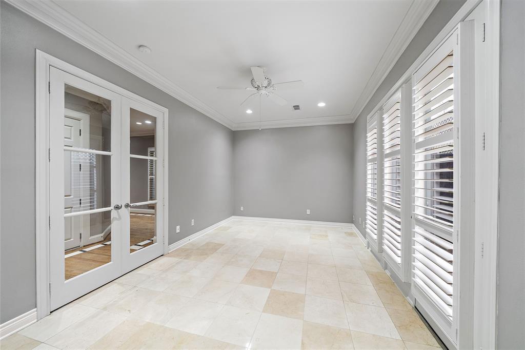 Tasteful and versatile, this first-floor secondary bedroom offers spacious accommodations that can easily be converted into a guest suite, a home office, or a lounge area, perfect for your changing lifestyle.