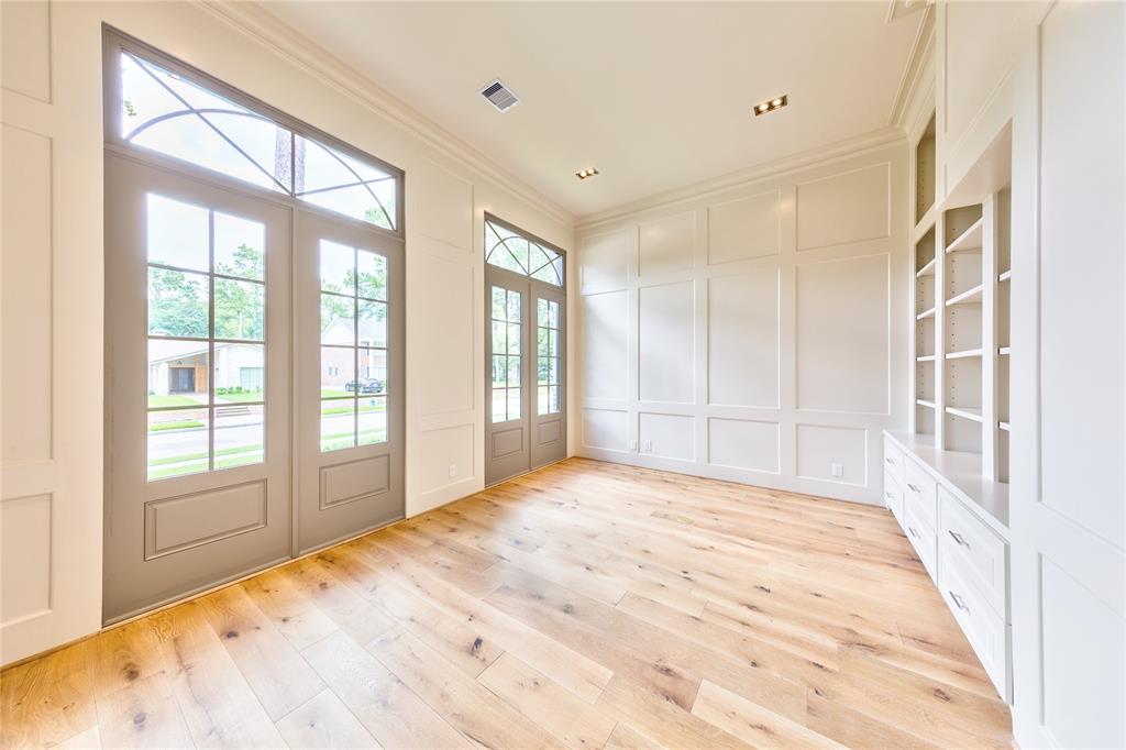 If a luxurious home office is a priority, add decorative features such as built in cabinets, panelled walls, and paint interir trim to enhance the perfect work-from-home-space as shown in this previously sold home.