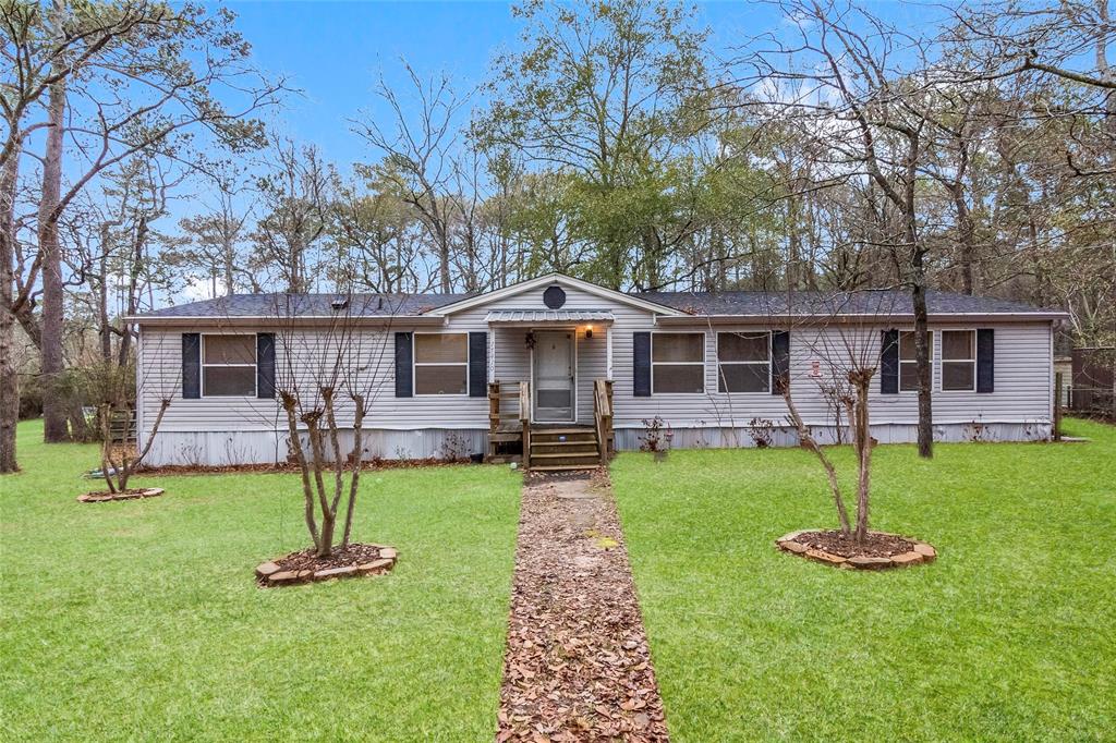 What a rare find! This property has been with family since the 90s. The home is 4 bedrooms, 2 baths, on almost an acre and in city limits of Magnolia with city water and city sewer. No MUD or HOA. Would make for a great rental or a residence. Home is in its original location when purchased new.