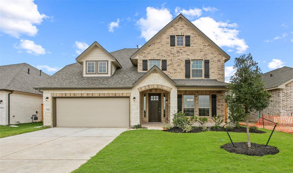 Charming Walton II home design by K. Hovnanian Homes with elevation B in beautiful Windrose Green.