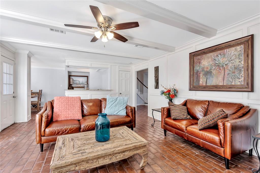 View of the living room facing the wet bar/breakfast area