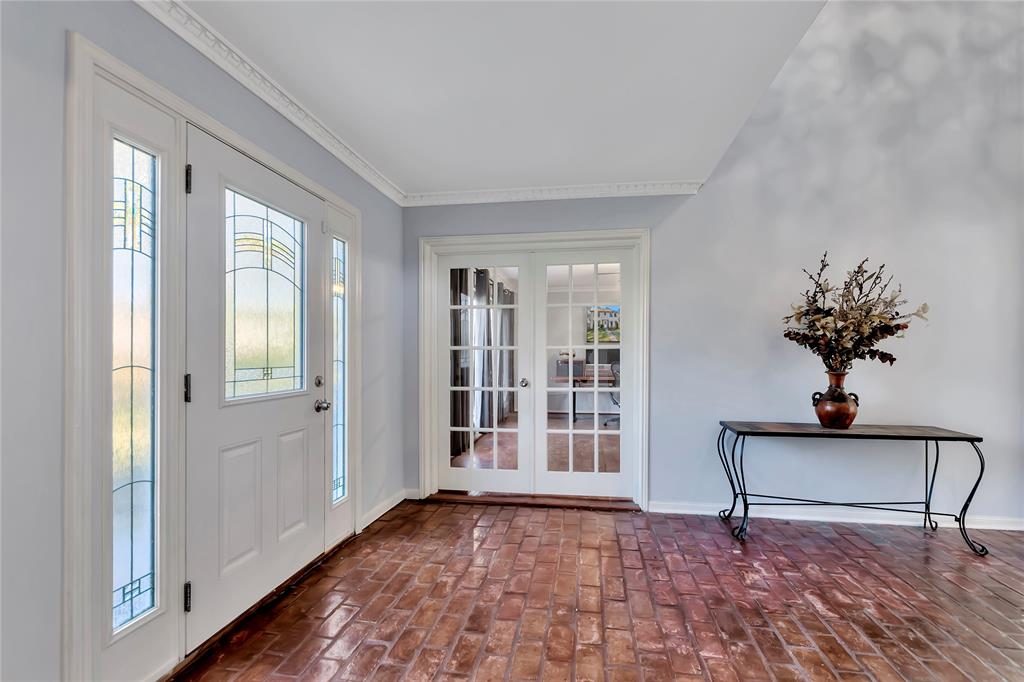 After entering the home, the office/den area is located directly to the left.