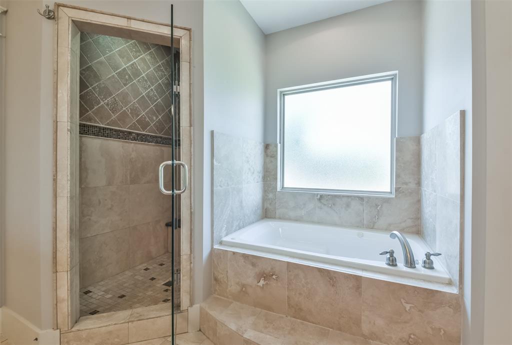 Walk in shower and separate bathtub