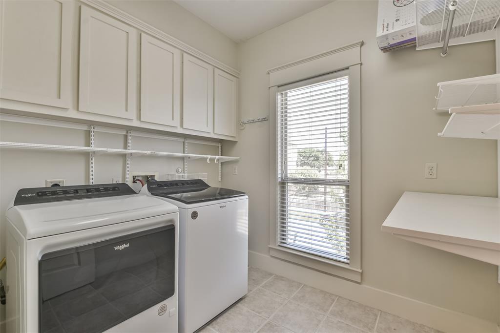 Laundry room with shelving.