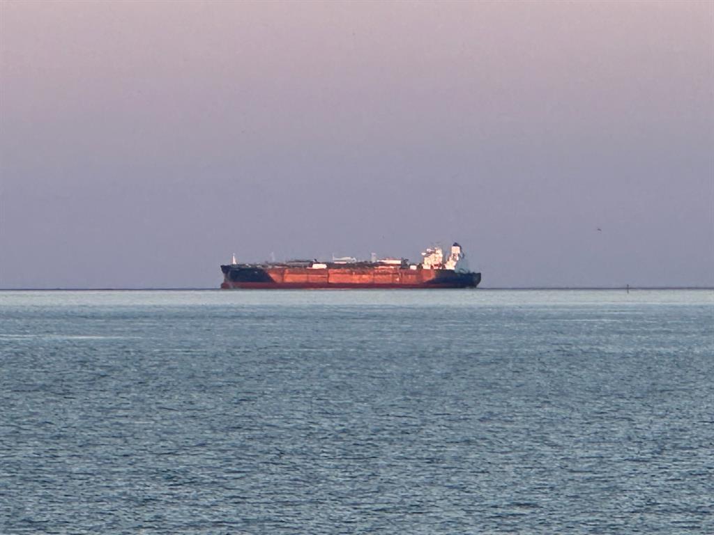 Ship in gulf across from development