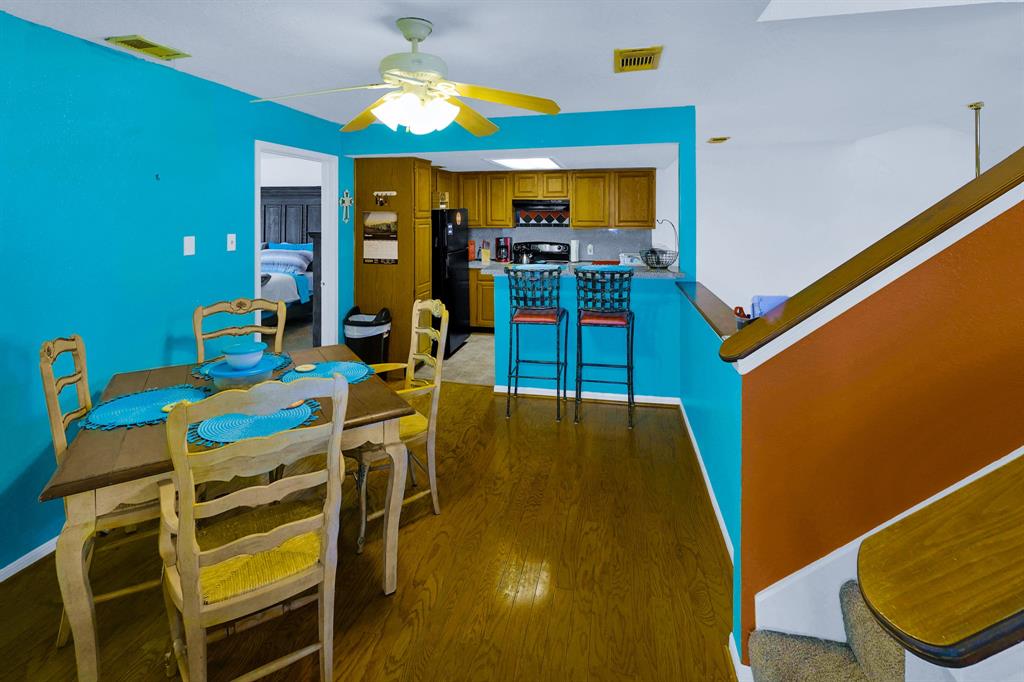 Kitchen/dining combo with bright happy colors!