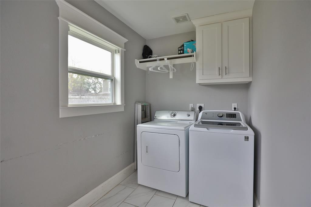 Washer & dryer located off the kitchen is included!