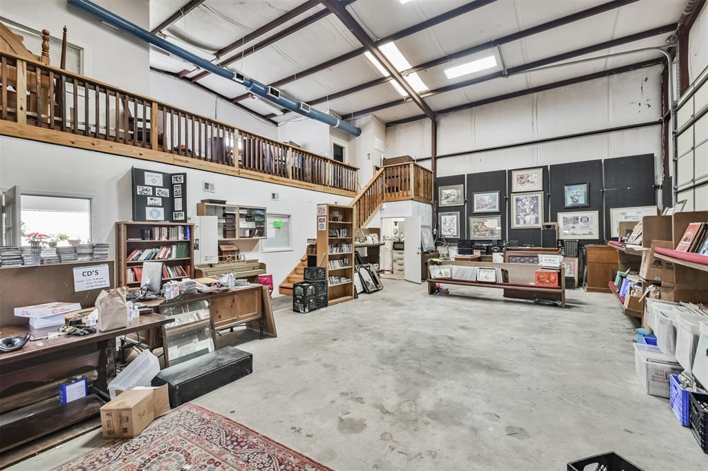 Large Warehouse area.  It and the offices are insulated, A/C and Heat. with Kitchenette and Full Bath. Also has upper level built out with 2 rooms and open landing.