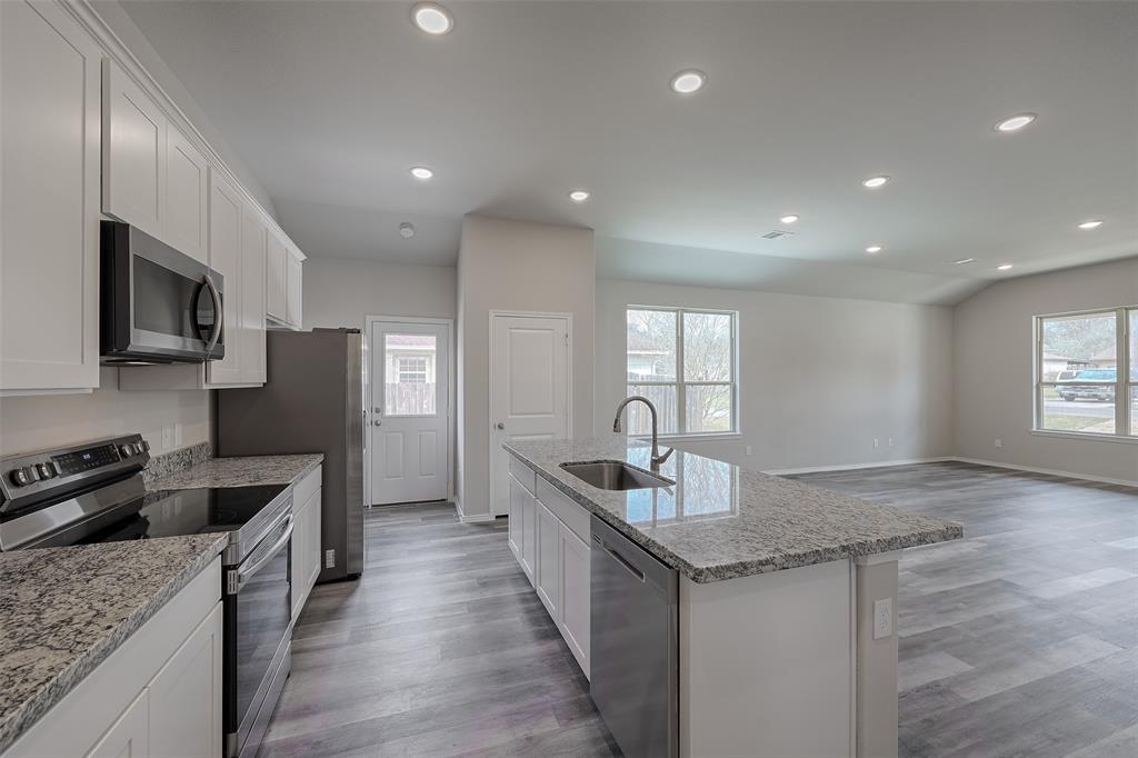 6910 Gentle Breeze Drive, Willis, TX 77318