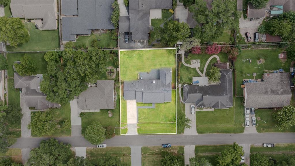 Aerial view of the lot before the pool was installed