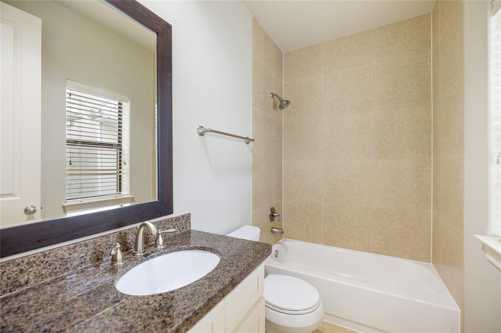 This spacious secondary bathroom is located just off the upstairs bedroom. Per the seller, Toilets and faucets have been replaced throughout between 2020 and 2022